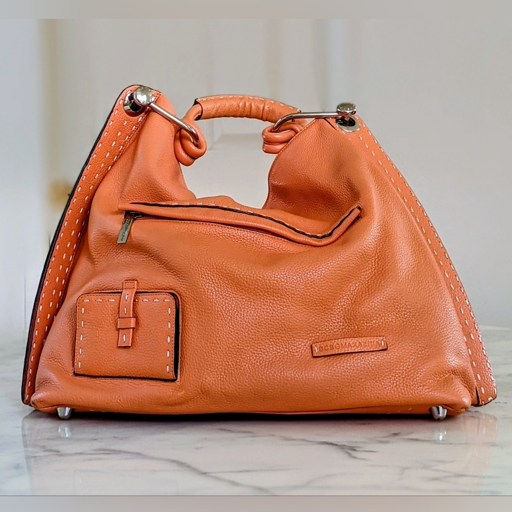 NWOT. BCBG Maxazria Orange Sigature Leather Large Hobo Bag.